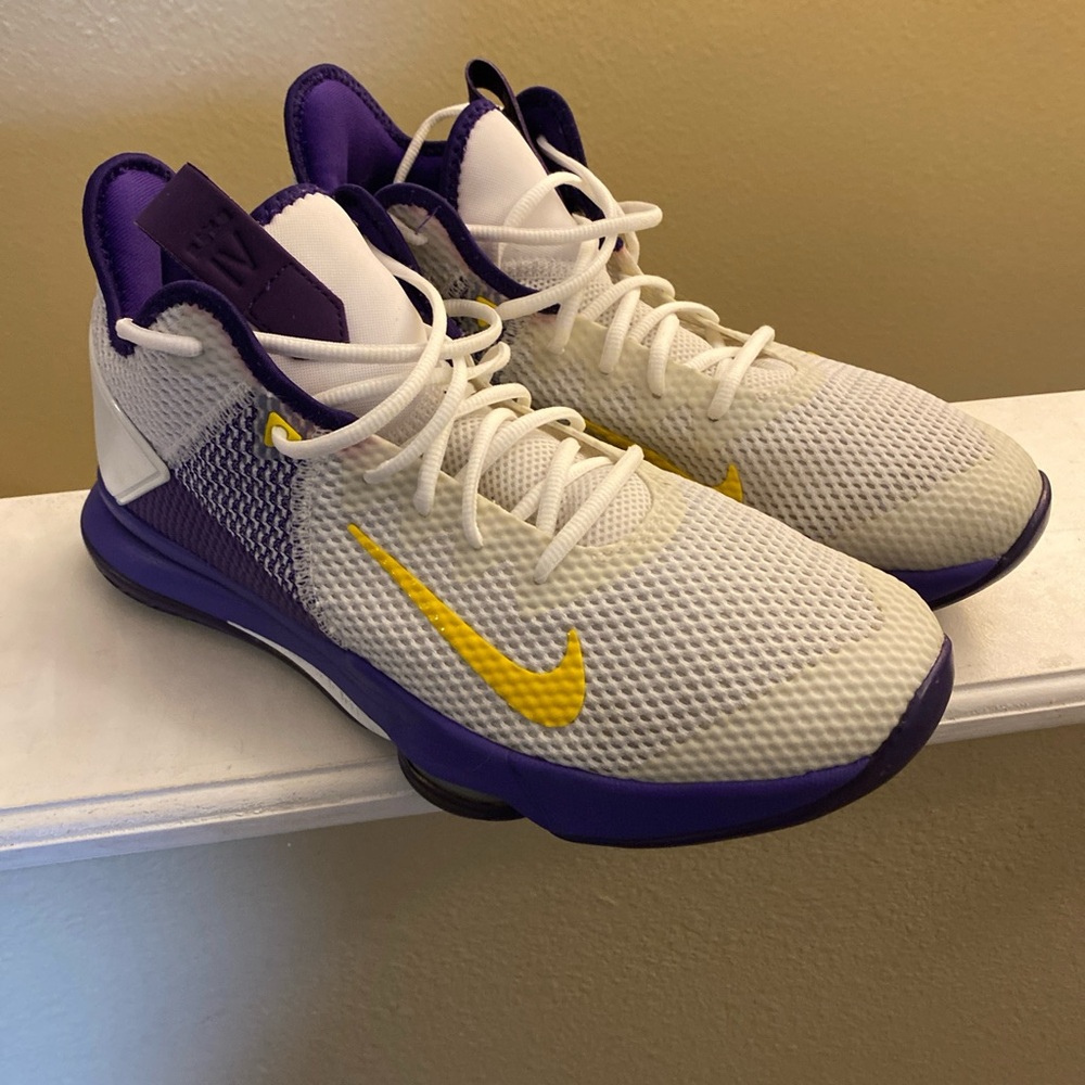 LeBron James 17 White and Purple Athletic Shoes with Yellow Swoosh